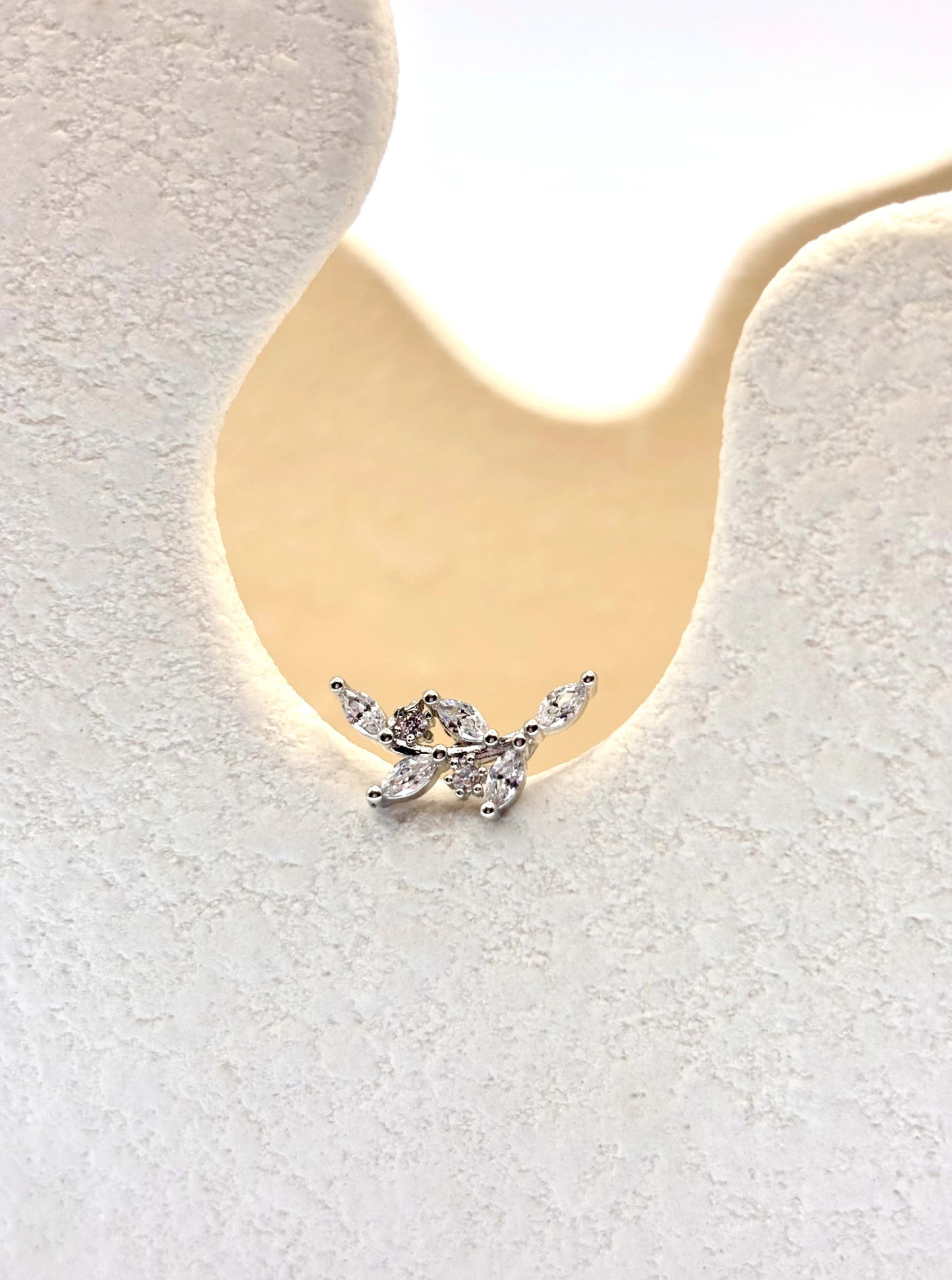 Silver grace ear piercing