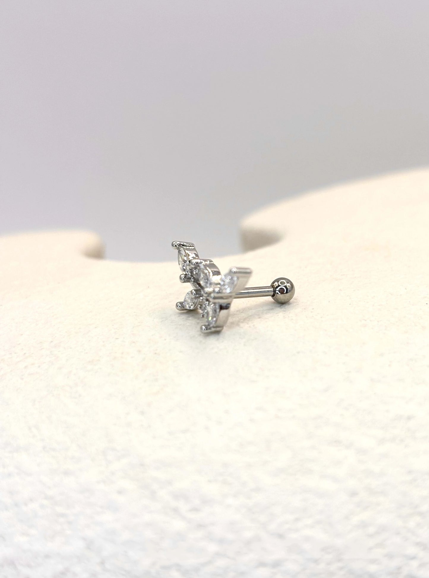 Silver grace ear piercing