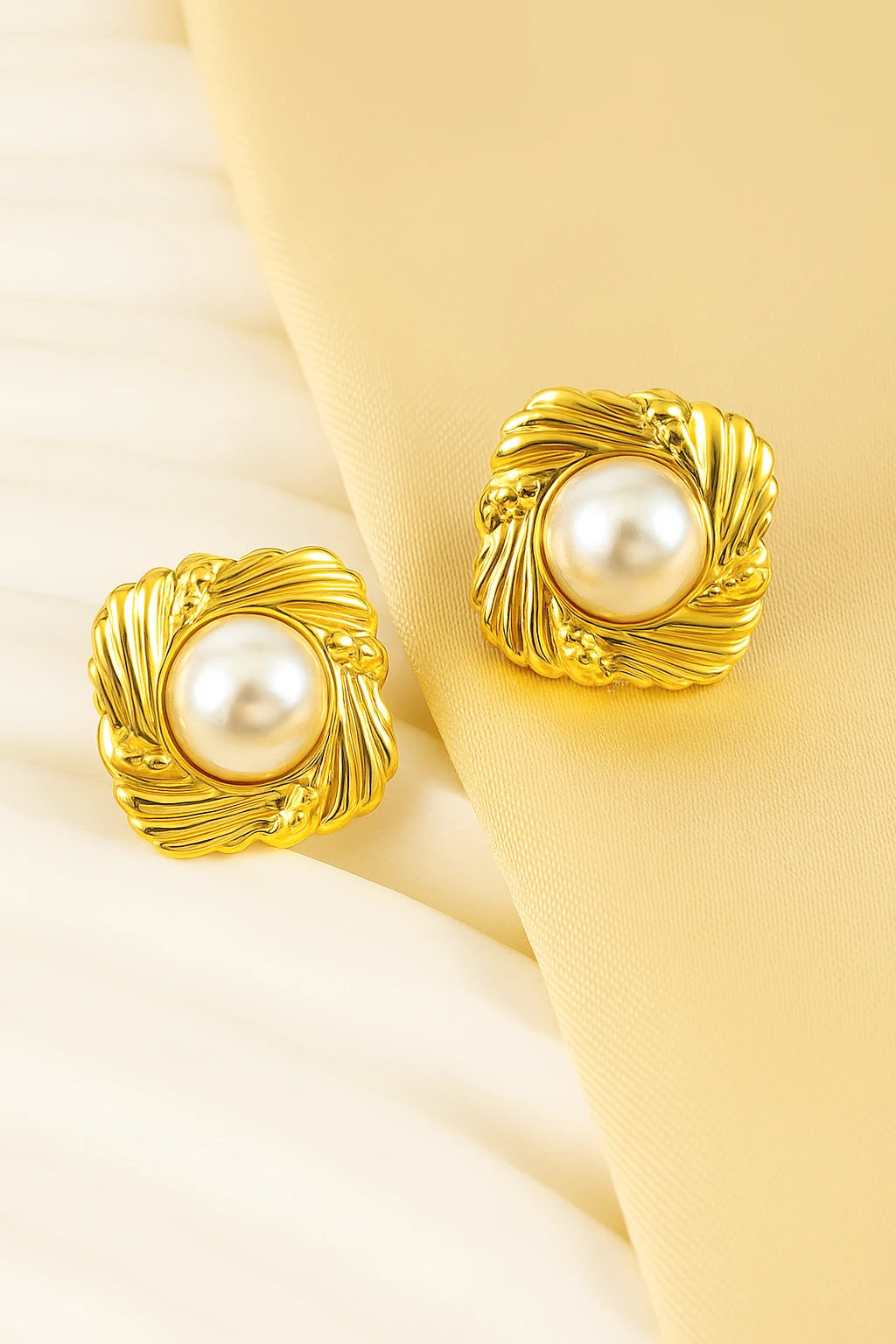Golden pearl earrings