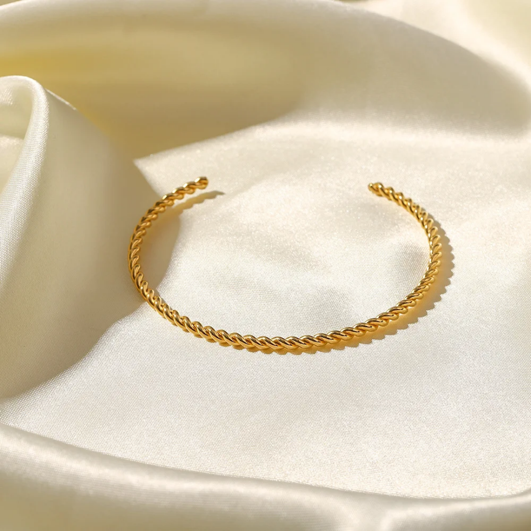 Twisted gold bangle