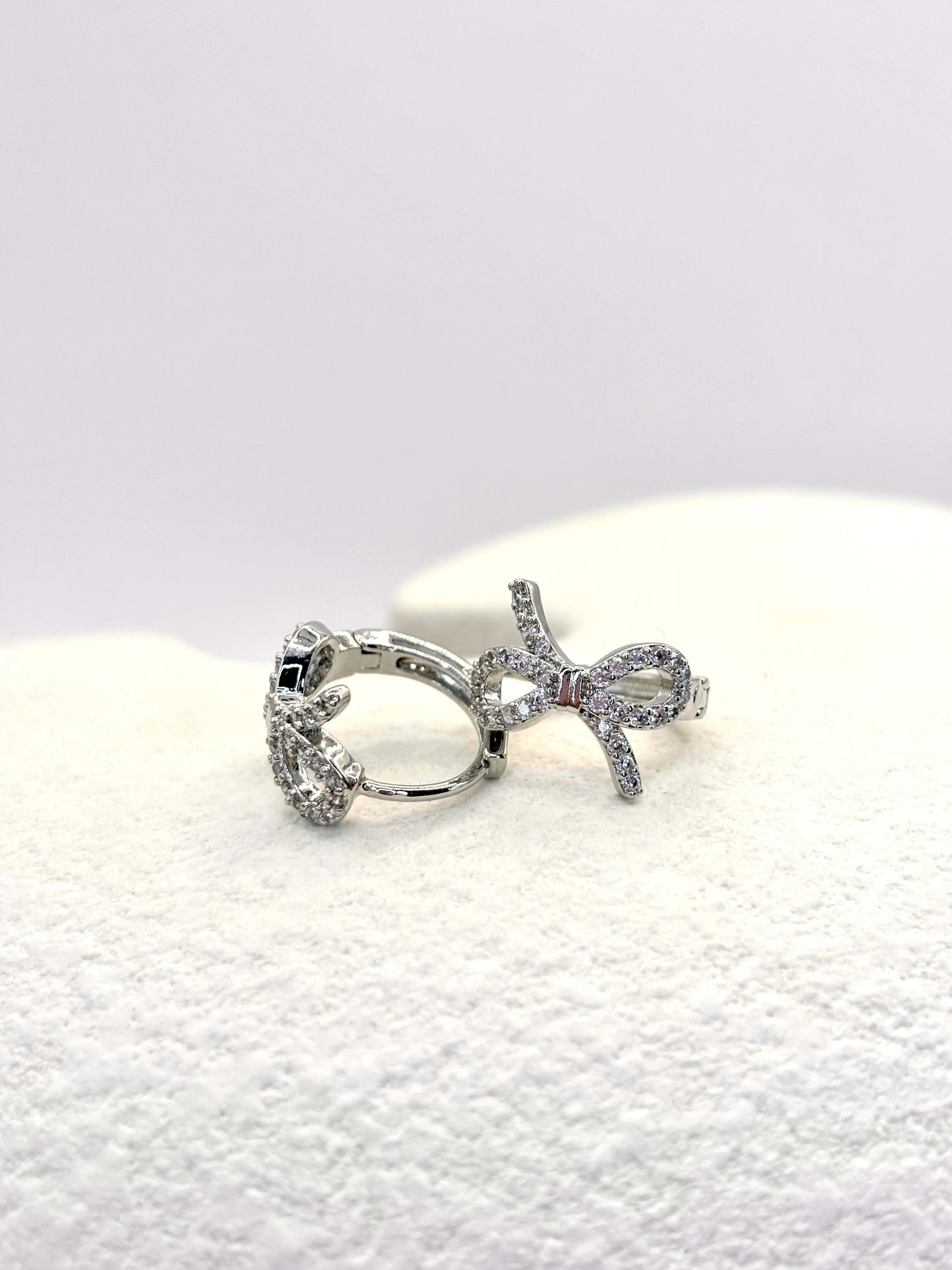 Twinkling tie earrings