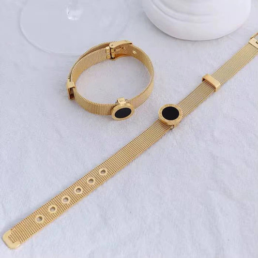 Golden Bulgari bangle